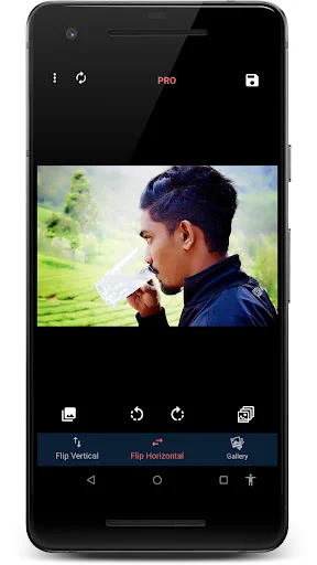 Flip Image app on mobile phone with portrait photo and flip vertical and horizontal button options