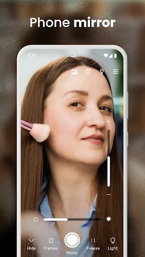 Basic phone mirror function showing woman applying makeup with beauty tool controls at bottom
